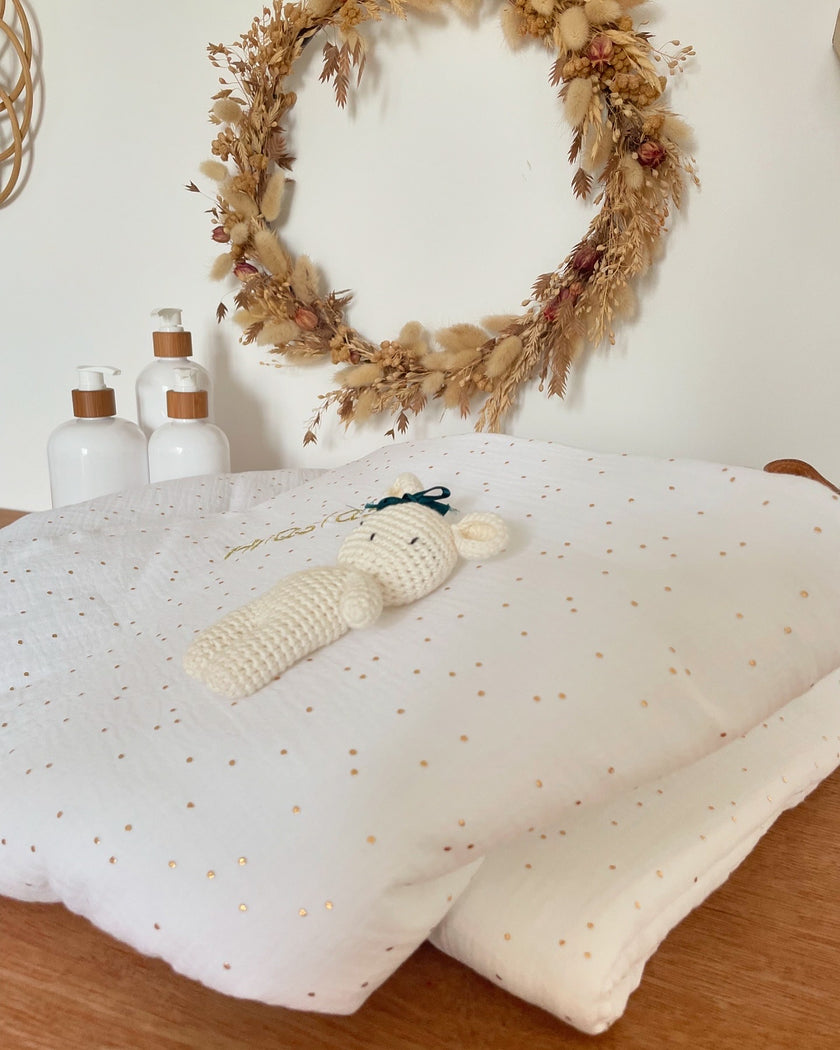 Couverture blanc doré