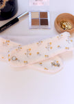 Bandeau de maquillage fleuri