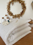 Couverture blanc doré
