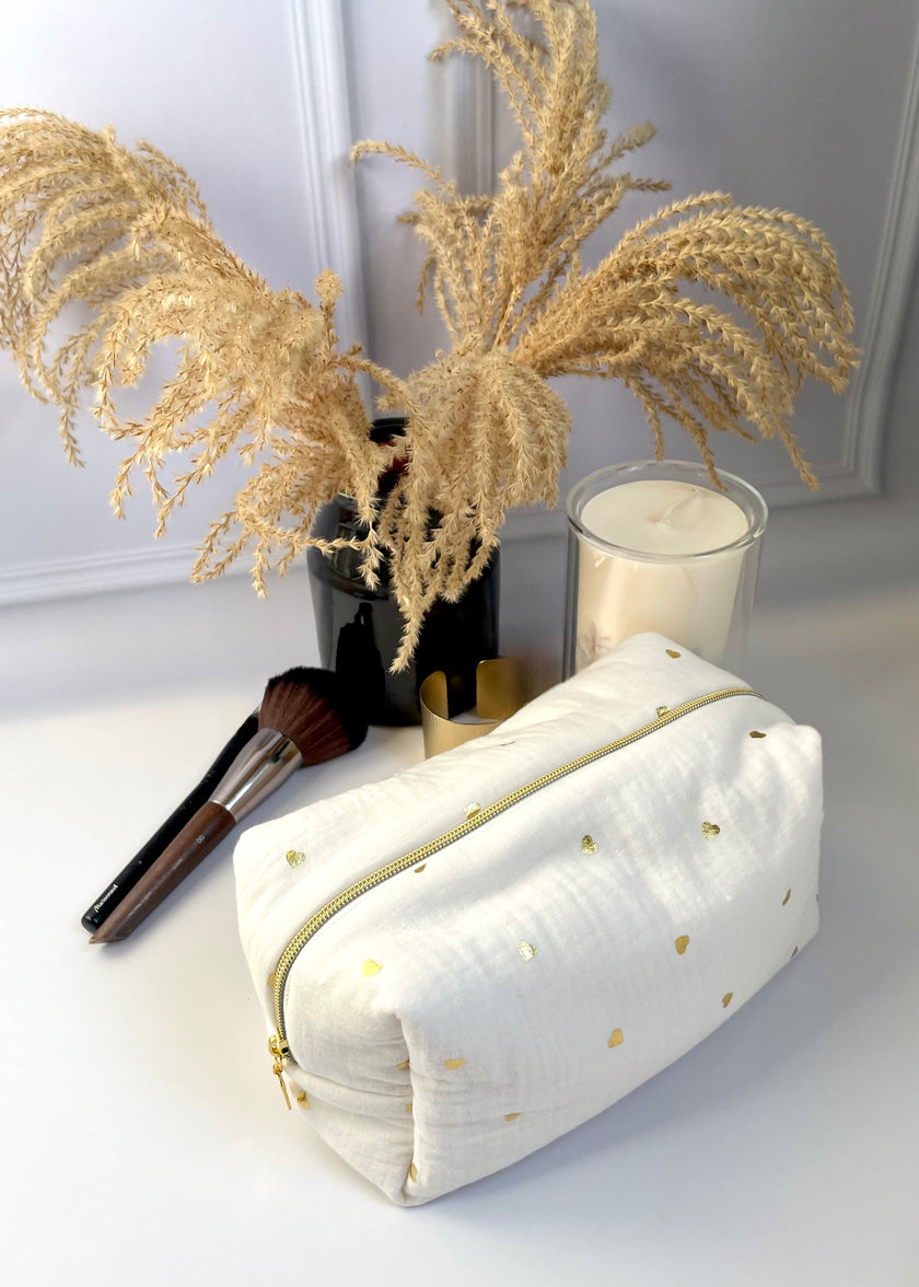Trousse de toilette femme coeurs or