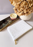 Pochette zippée blanc doré