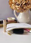 Pochette zippée blanc doré