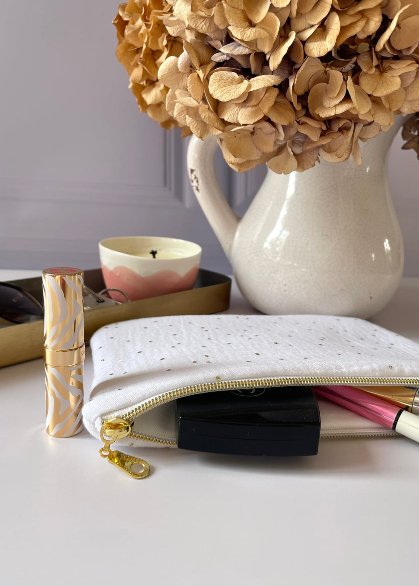 Pochette zippée blanc doré