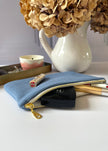 Pochette zippée jersey bleu