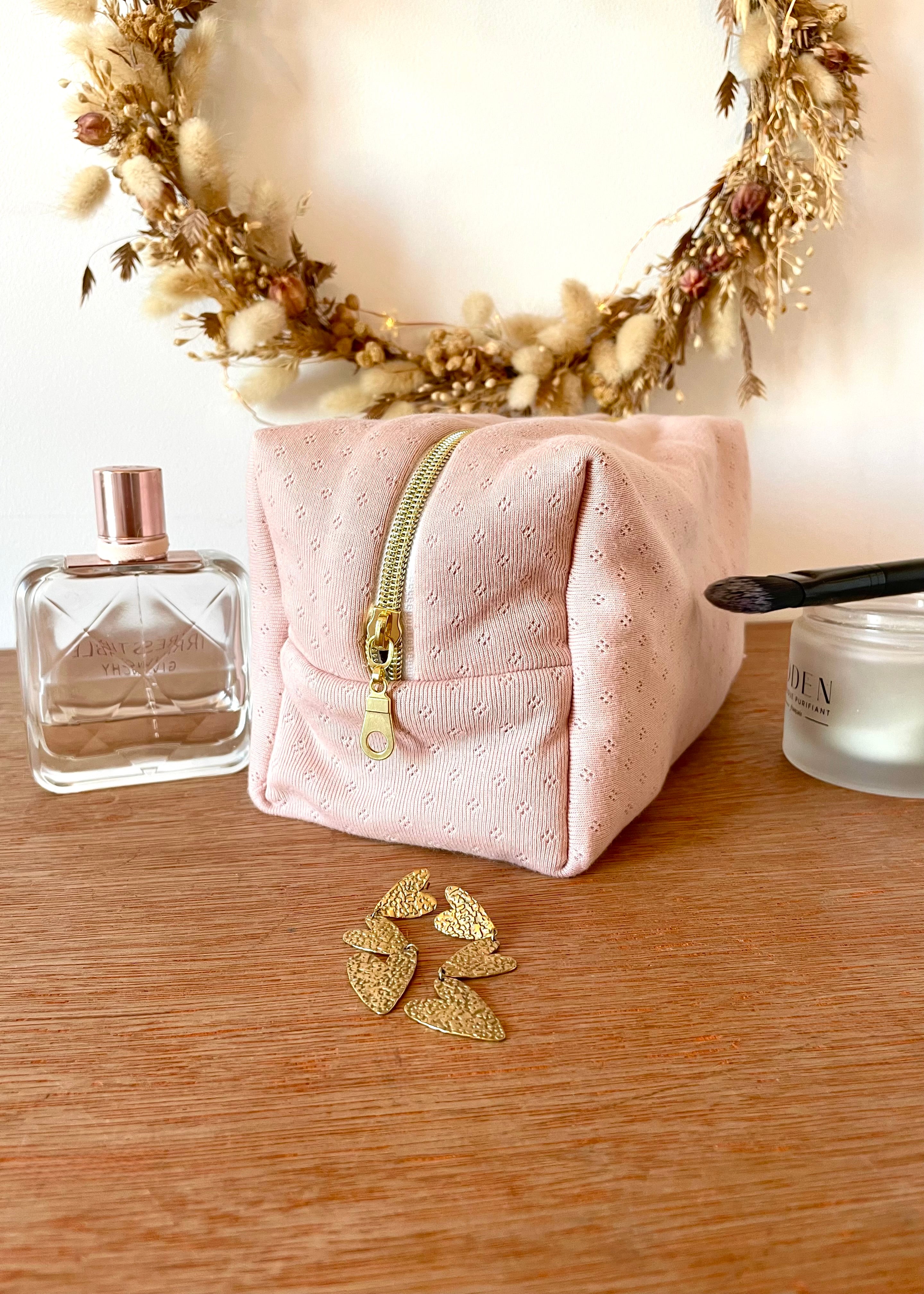 Trousse de toilette en jersey rose pointelle