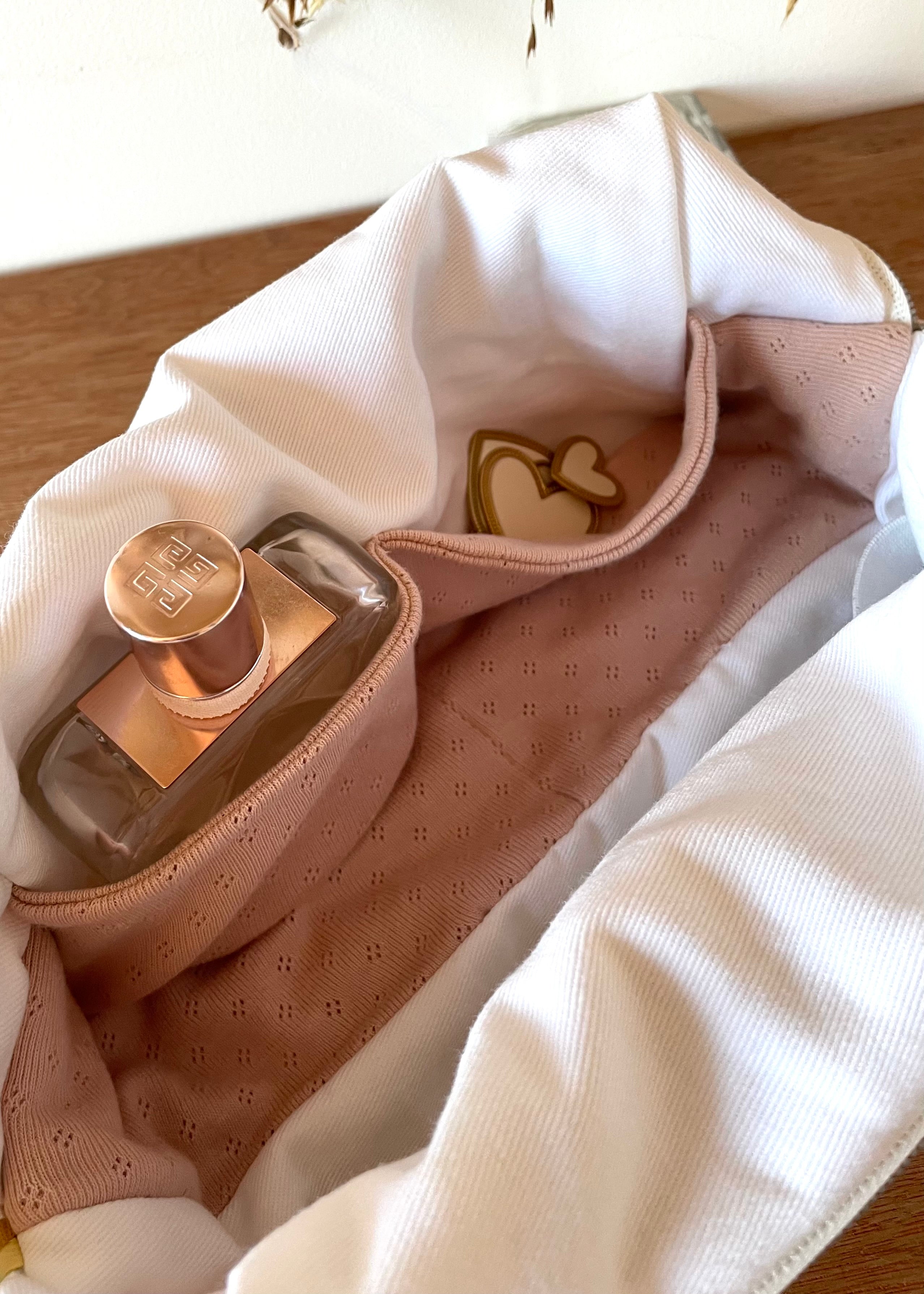 Trousse de toilette en jersey rose pointelle