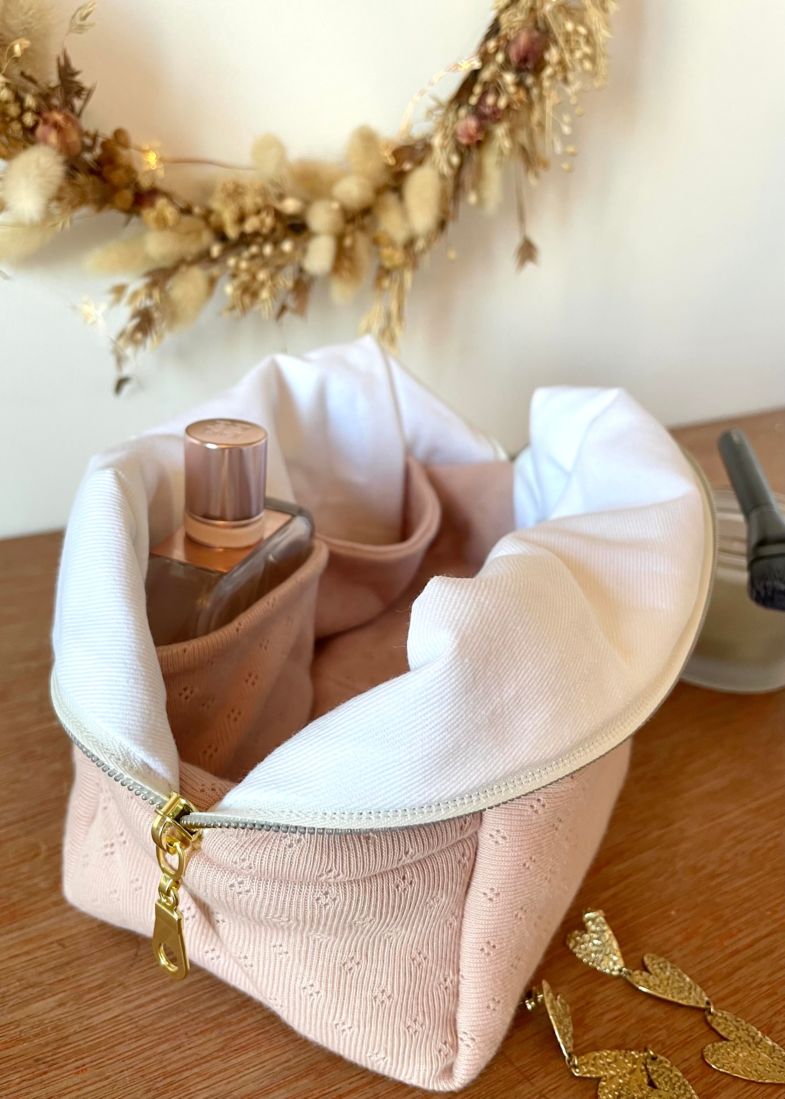 Trousse de toilette en jersey rose pointelle
