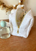 Trousse de toilette blanc doré