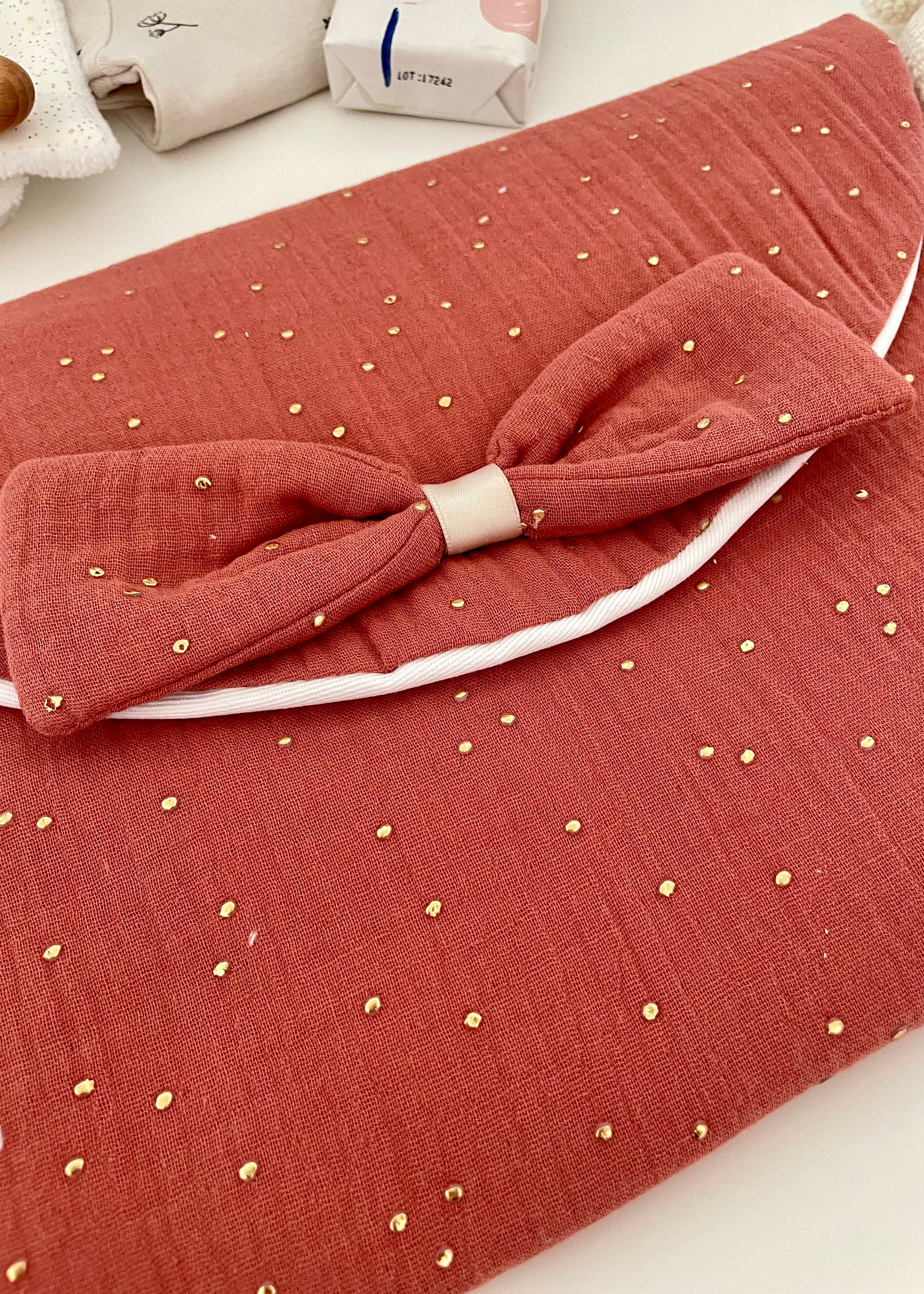 Pochette à couches terracotta doré