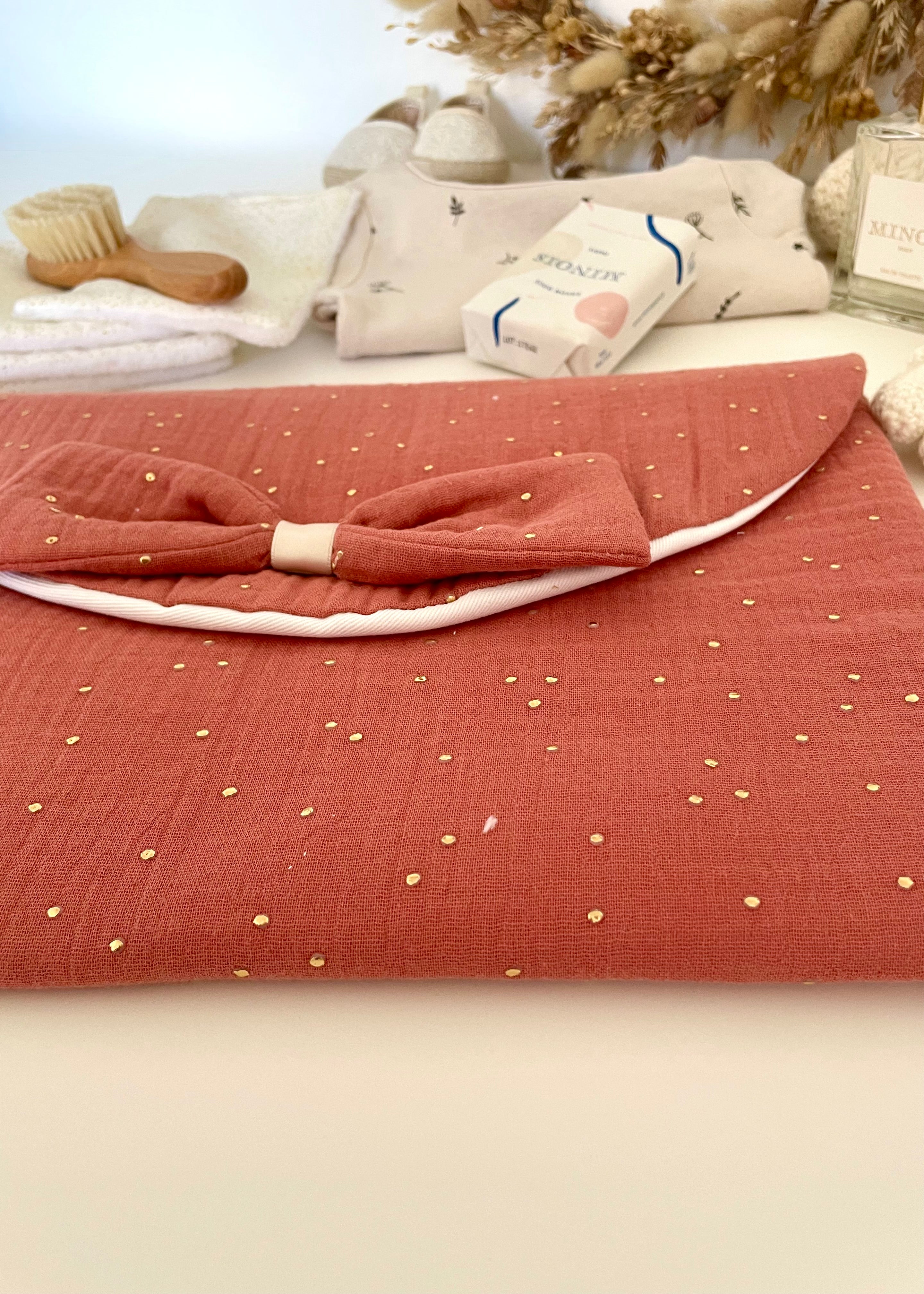 Pochette à couches terracotta doré
