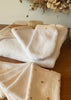 Sortie de bain et ses 2 gants de toilette