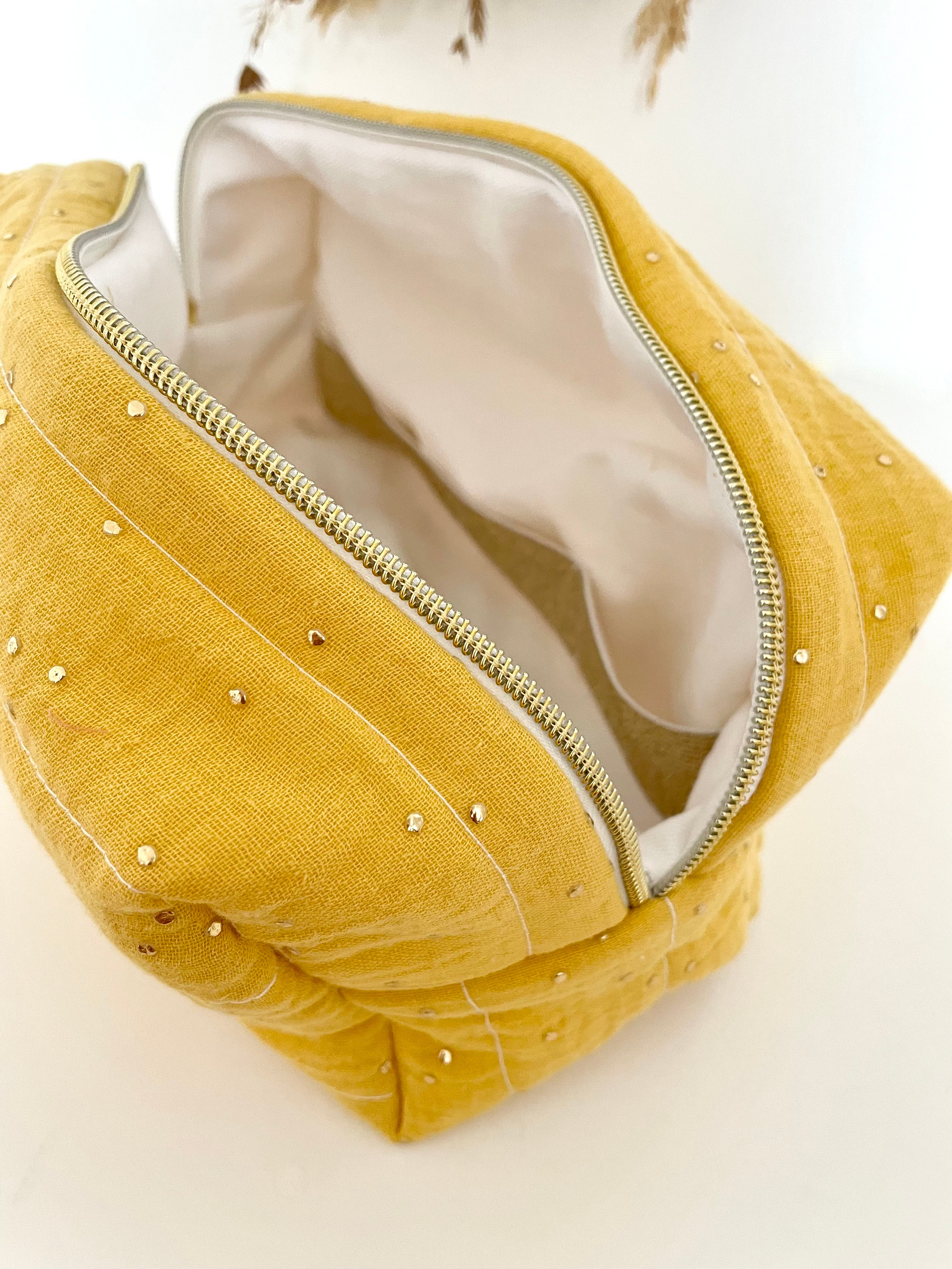 Trousse de toilette moutarde doré
