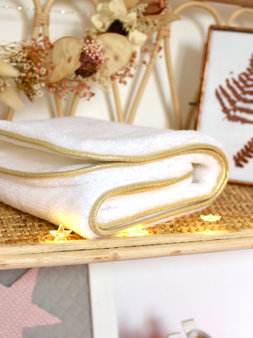 Serviette de protection matelas à langer supplémentaire