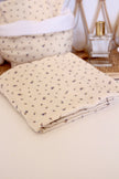 lange pour bébé en coton couleur écru avec motifs fleuris bleu
